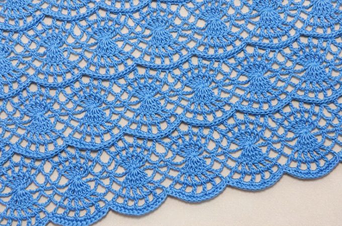 Crochet Lace Waves Motif Featured - The world of crochet is vast and filled with enchanting patterns and motifs, but the crochet lace waves motif stands out for its delicate beauty and rhythmic flow.