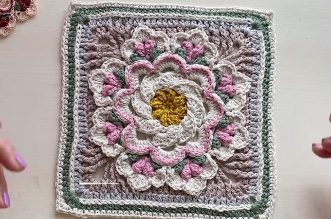 Crochet 3d Petal Granny Square Featured - The timeless appeal of the classic granny square has evolved with countless variations, and among the most breathtaking is the crochet 3D petal granny square.