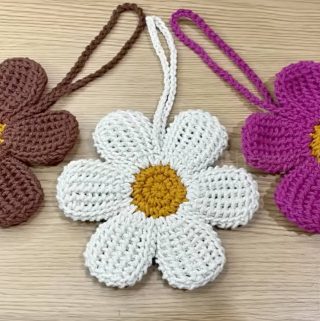 Crochet Flower Keychain Featured - Crochet flower keychains are more than just functional accessories—they're delightful tokens of creativity. Compact, vibrant, and versatile, these handmade gems make excellent gifts or personal keepsakes.